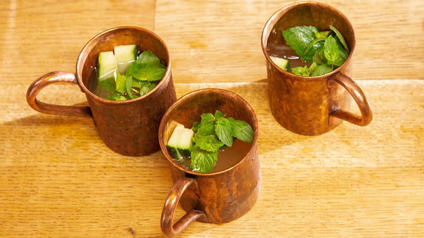 3 "Ginger Mule" ready mixed in copper cups and decorated.
