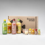 Inhalt des Ingwer Shot Probiersets M vor der Box aufgestellt.