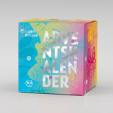 Kloster Kitchen Adventskalender in quadratischer Kartonbox mit buntem Farbverlauf in Blau, Grün, Gelb und Pink, weißem Schriftzug, nummerierten Türchen und Bio-Siegel.